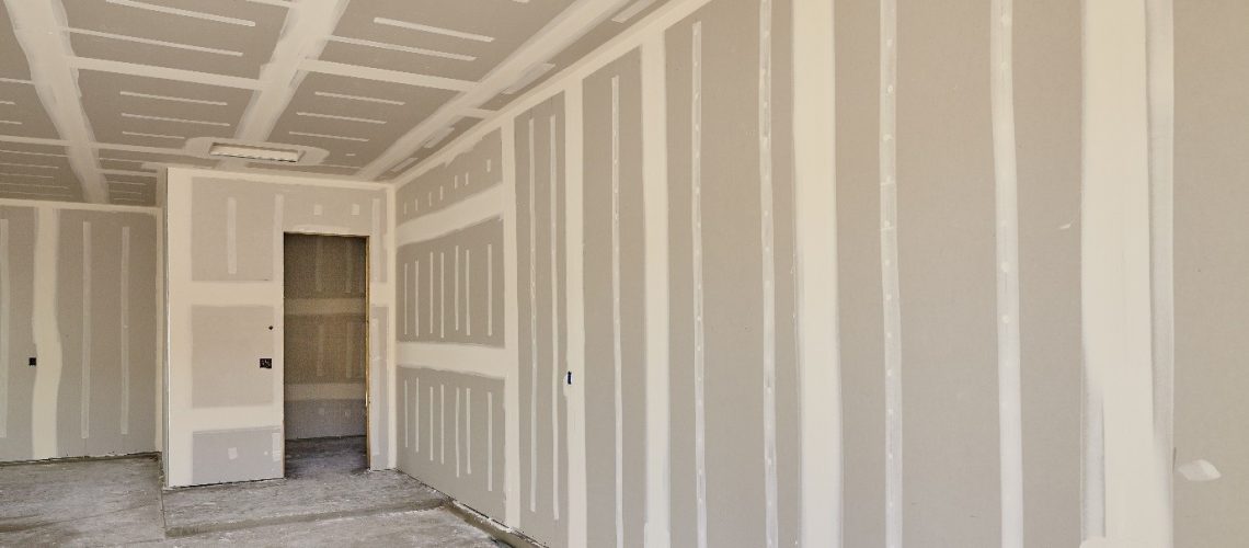 Drywall repair after plumbers HVAC and electricians Michigan